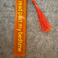 Orange resin book mark 