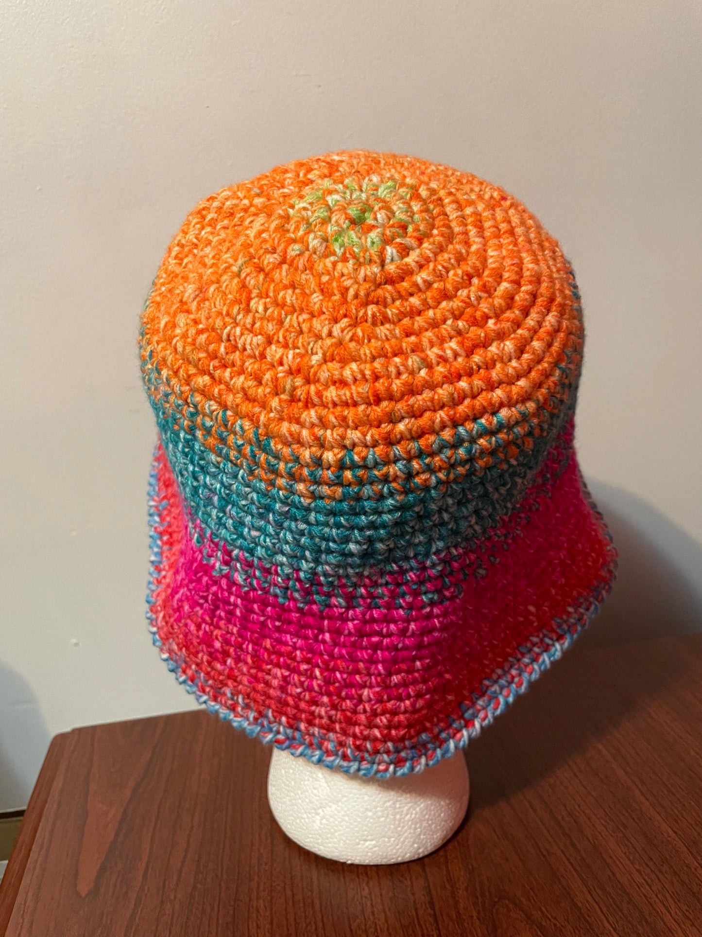 Bright rainbow colored bucket hat